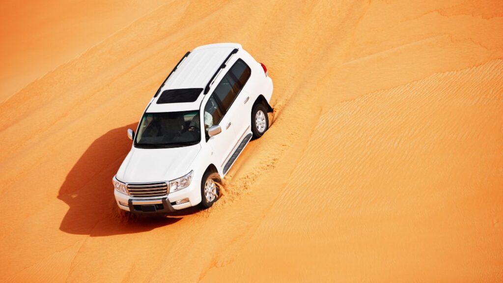 Try dune bashing to experience the deserts of Doha