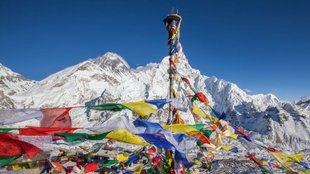 The flags with the Himalayas in the background is worth the trip when you visit Nepal