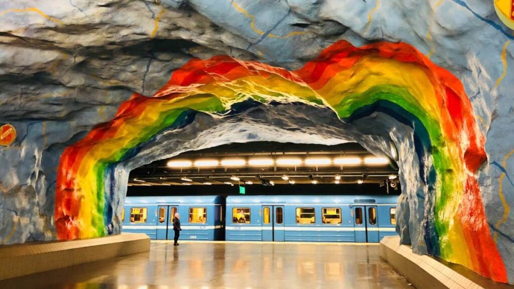 Solo travel, beautifully painted cave that's also the entrance of the metro in Stockholm