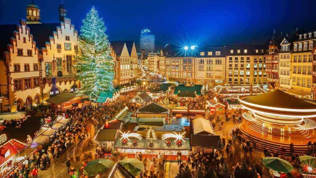 Places to go for Christmas, view of the crowded Christmas market of Bruges