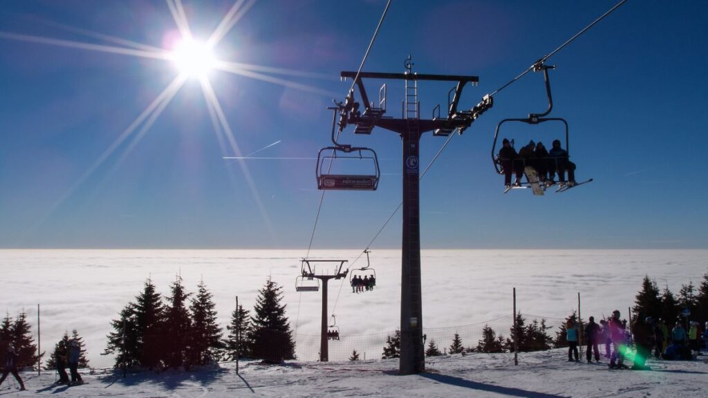 Where to go for Christmas, people skiing in the snow in Nagano