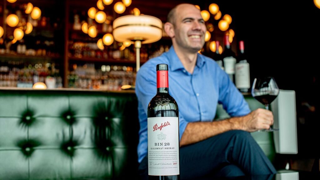 Sam along with one of the latest wines from the Penfolds collection