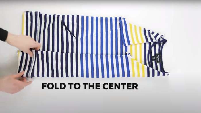 How to fold clothes for travel - How to roll short-sleeve shirts, step 3