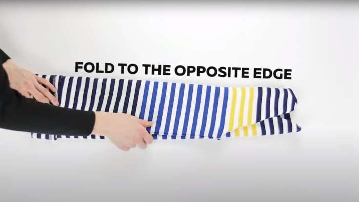 How to fold clothes for travel - How to roll short-sleeve shirts, step 4