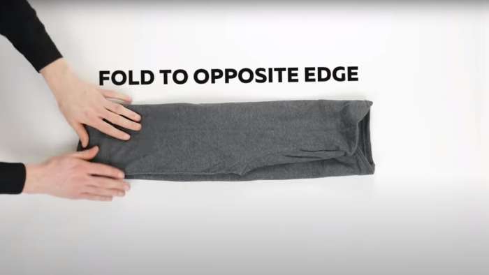 How to pack clothes - How to roll long-sleeved shirts, step 5