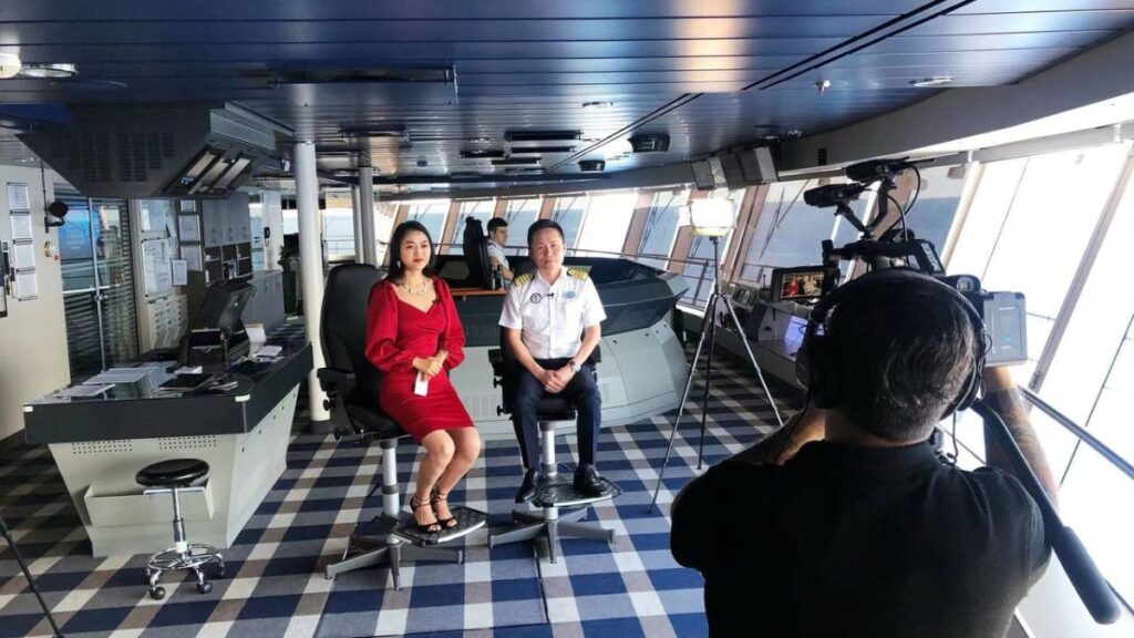 Bonnie Bai from Royal Caribbean filming aboard the ship
