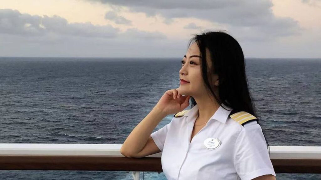 Bonnie Bai from Royal Caribbean in full uniform