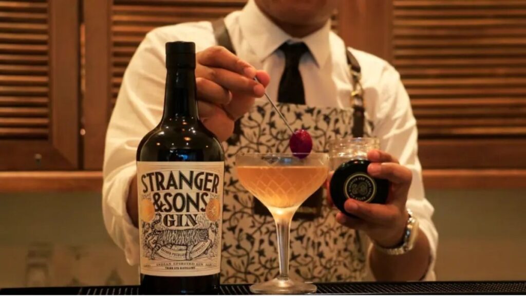 A bartender making a Stranger and Sons gin cocktail