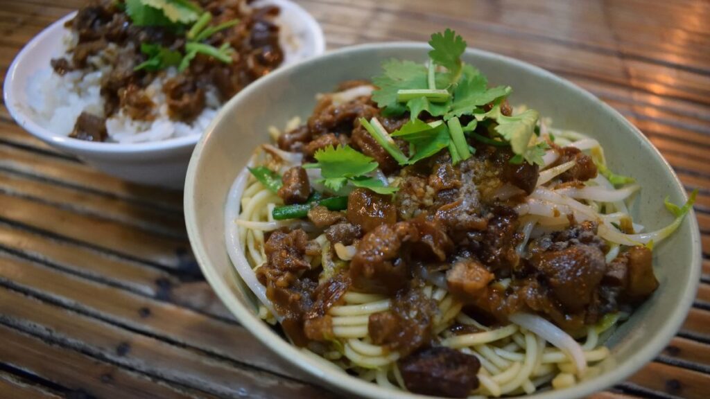 Braised pork over rice is commonly eaten during lunch and is simple Taiwan food dish